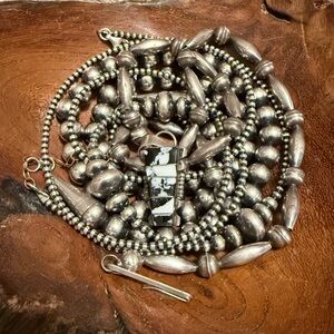 White Buffalo and sterling silver pendant